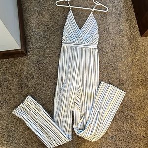 4SI3NNA striped romper. Backless with cross and tie at the back. Size M